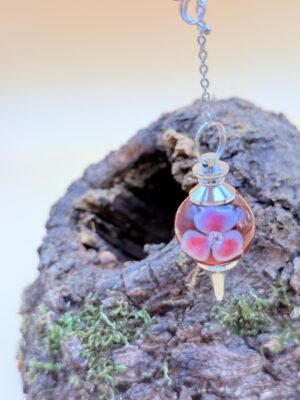 Pendule rubis avec inclusion de zircons